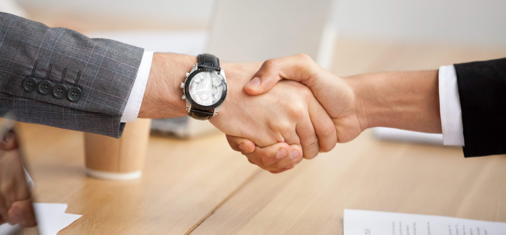 closeup-view-of-handshake-two-businessmen-in-suits-shaking-hands.jpg closeup-view-of-handshake-two-businessmen-in-suits-shaking-hands.jpg